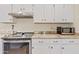 Close-up of the kitchen featuring stainless steel appliances and granite countertops at 8499 E Jumping Cholla Dr, Gold Canyon, AZ 85118