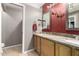 Bathroom with sink and granite countertop and unique modern mirror at 911 W Sandra Ter, Phoenix, AZ 85023