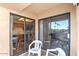 Balcony with kitchen view and patio furniture at 9270 E Mission Ln # 211, Scottsdale, AZ 85258