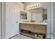 Stylish bathroom featuring dual sinks, elegant fixtures, and plenty of storage at 928 S San Joaquin Ct, Gilbert, AZ 85296