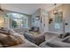 Living room with new flooring, vaulted ceiling, and ample natural light at 928 S San Joaquin Ct, Gilbert, AZ 85296