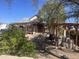 Spacious backyard featuring a covered patio and wooden pergola at 94 W 12Th St, Florence, AZ 85132