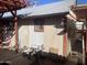 Exterior view of the home with a fenced backyard at 94 W 12Th St, Florence, AZ 85132