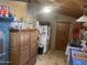 Kitchen showcasing wood cabinets, tile flooring, stainless steel refrigerator, and a wood ceiling at 94 W 12Th St, Florence, AZ 85132