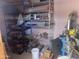 A pink workshop featuring metal shelving and some power tools at 94 W 12Th St, Florence, AZ 85132