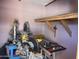 A pink workshop with a miter saw and table saw at 94 W 12Th St, Florence, AZ 85132