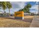 Exterior view of Hohokam Stadium Home of the Athletics sign with palm trees at 945 N Pasadena -- # 52, Mesa, AZ 85201