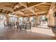 Community covered patio with tables, chairs, and drinking fountain at 945 N Pasadena -- # 52, Mesa, AZ 85201