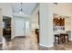 Open concept living area featuring tiled flooring and an inviting transition to the kitchen area at 945 N Pasadena -- # 52, Mesa, AZ 85201