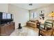 Cozy living room featuring bright window, and tan tile floor at 945 N Pasadena -- # 52, Mesa, AZ 85201