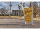 Exterior view of Fitch Park Athletics sign with palm trees at 945 N Pasadena -- # 52, Mesa, AZ 85201