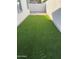 Low-maintenance backyard with artificial turf at 1030 E Susan Ln, Tempe, AZ 85288