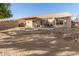 View of the backyard featuring a covered patio and space for outdoor living and entertaining at 10307 W Windsor Blvd, Glendale, AZ 85307