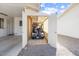 View of a golf cart inside a storage closet located inside the covered carport at 10423 W Monterosa Dr, Sun City, AZ 85351