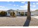 Charming single-story home featuring desert landscaping, a covered porch, and a well-maintained exterior at 10423 W Monterosa Dr, Sun City, AZ 85351