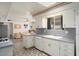 Functional kitchen with modern appliances, ample counter space, and seamless connection to the dining area at 10423 W Monterosa Dr, Sun City, AZ 85351