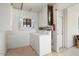 Laundry room with appliances and white cabinetry at 10423 W Monterosa Dr, Sun City, AZ 85351