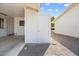 Convenient storage closet with double doors located in the carport area at 10423 W Monterosa Dr, Sun City, AZ 85351