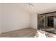 Bedroom featuring a ceiling fan and a sliding glass door providing access to outdoor space at 1157 W Edgewater Dr, Gilbert, AZ 85233