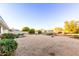 Wide backyard shot with desert-style landscaping, showcasing the low-maintenance charm and ample space of the property at 13234 W Desert Glen Dr, Sun City West, AZ 85375