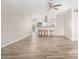 Bright and airy living room open to the modern kitchen featuring breakfast bar at 13234 W Desert Glen Dr, Sun City West, AZ 85375