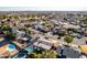 Aerial view of a single Gathering home in a residential area with multiple inground pools in the area at 1353 N Avoca --, Mesa, AZ 85207