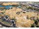 An aerial view of a lush green park, with picnic areas, walking paths, and plenty of open space at 1353 N Avoca --, Mesa, AZ 85207