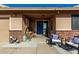 Charming front porch with a cozy seating area, rustic decor and a welcoming entrance at 1353 N Avoca --, Mesa, AZ 85207