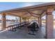 Large covered ramada in the community park with picnic tables for residents' enjoyment at 1353 N Avoca --, Mesa, AZ 85207