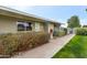 Inviting home exterior with lush greenery and a well-manicured lawn at 13633 N 111Th Ave, Sun City, AZ 85351