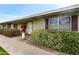 Charming home exterior featuring well-maintained landscaping and a cozy front porch at 13633 N 111Th Ave, Sun City, AZ 85351