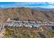 Scenic aerial perspective of elegant residences nestled amidst desert terrain and rolling hills at 14543 N Adero Canyon Dr, Fountain Hills, AZ 85268