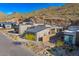 Stunning aerial view of modern homes nestled in a desert landscape with mountain backdrop at 14543 N Adero Canyon Dr, Fountain Hills, AZ 85268