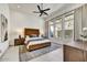 Serene bedroom featuring a large window with scenic views, complemented by modern furnishings and soothing decor at 14543 N Adero Canyon Dr, Fountain Hills, AZ 85268