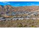 Scenic view of a modern community nestled in the mountains, featuring stylish homes with stunning mountain backdrops at 14543 N Adero Canyon Dr, Fountain Hills, AZ 85268