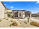 Stylish single-story home features desert landscaping and modern architecture, set against a mountain backdrop at 14543 N Adero Canyon Dr, Fountain Hills, AZ 85268