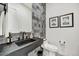 Modern powder room featuring a floating vanity, and stylish fixtures at 14543 N Adero Canyon Dr, Fountain Hills, AZ 85268