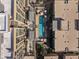 Aerial view of a multi-story building with a pool, cabanas, and well-maintained landscaping at 15215 N Kierland Blvd # 106, Scottsdale, AZ 85254