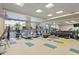 Well-equipped gym with treadmills, weights, and mirrors at 15215 N Kierland Blvd # 106, Scottsdale, AZ 85254