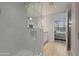 Walk in shower with glass doors at 15215 N Kierland Blvd # 106, Scottsdale, AZ 85254