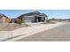 Beautiful single-Gathering home featuring a well-maintained yard and attached two-car garage at 15762 W Cheryl Dr, Waddell, AZ 85355
