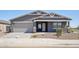 Attractive single-story house with a two-car garage and manicured landscaping in a desirable community at 15762 W Cheryl Dr, Waddell, AZ 85355