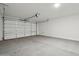 Spacious two-car garage with ample room for vehicles and storage at 15762 W Cheryl Dr, Waddell, AZ 85355