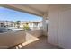 A balcony overlooking the neighborhood, complete with tiled floors and a white railing at 16013 S Desert Foothills Pkwy # 2077, Phoenix, AZ 85048