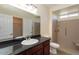 Bathroom with tile flooring, walk in shower and a spacious vanity at 16013 S Desert Foothills Pkwy # 2077, Phoenix, AZ 85048