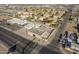 Elevated view of a commercial building with a large parking lot, surrounded by residential areas and city streets at 1610 W Buckeye Rd, Phoenix, AZ 85007