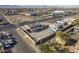 The commercial building features an expansive parking area on a city street with mountain views in the distance at 1610 W Buckeye Rd, Phoenix, AZ 85007