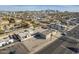 Wide aerial view of a commercial building located among residential properties, cityscape in the distance at 1610 W Buckeye Rd, Phoenix, AZ 85007