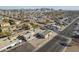 Wide aerial view of a commercial building with a city skyline and mountains in the background at 1610 W Buckeye Rd, Phoenix, AZ 85007