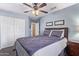 Comfortable bedroom with a ceiling fan, closet, and stylish decor at 16412 N 168Th Ln, Surprise, AZ 85388